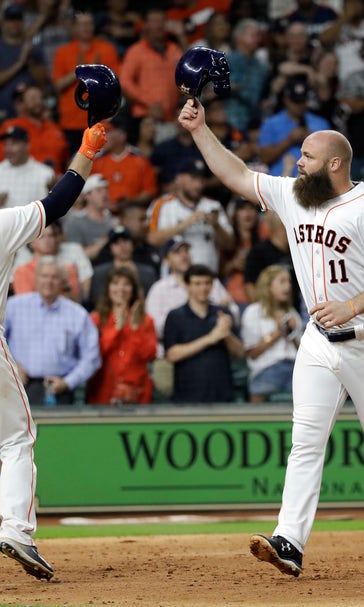 Astros hit 5 homers to end skid with 12-1 win over Rockies